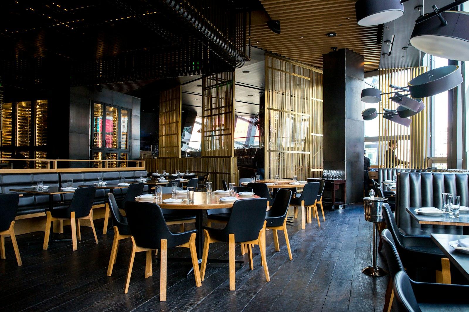 Warm timber dining room and intimate tables